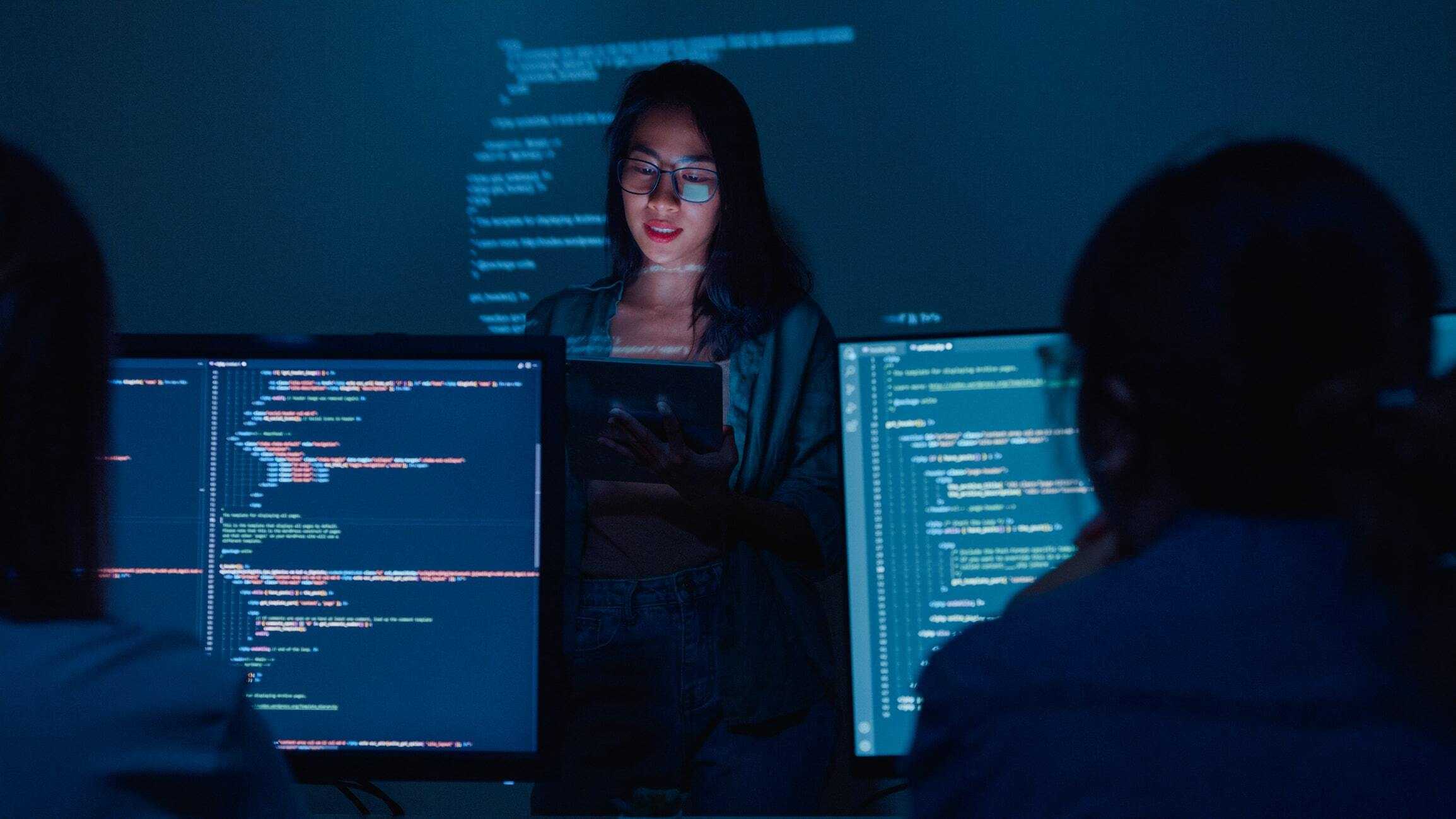Instructor teaching code to students